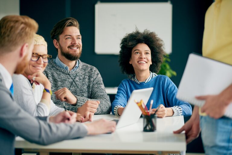 Multi ethnic team working in modern office