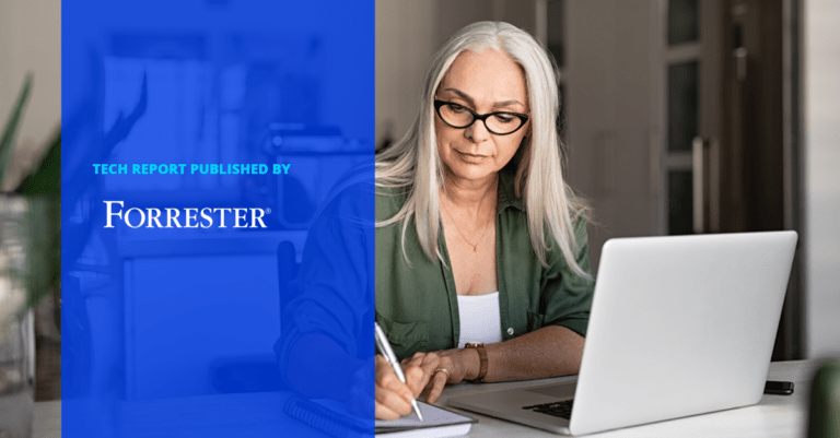 woman writing at desk