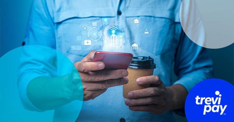 photo of person's hands holding phone and coffee with trevipay branding