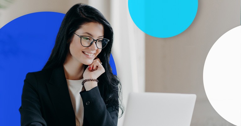 woman looking at laptop