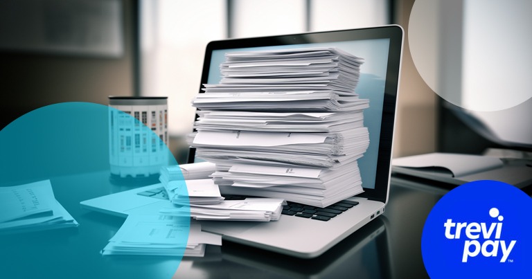 invoices stacked on a laptop with trevipay branding