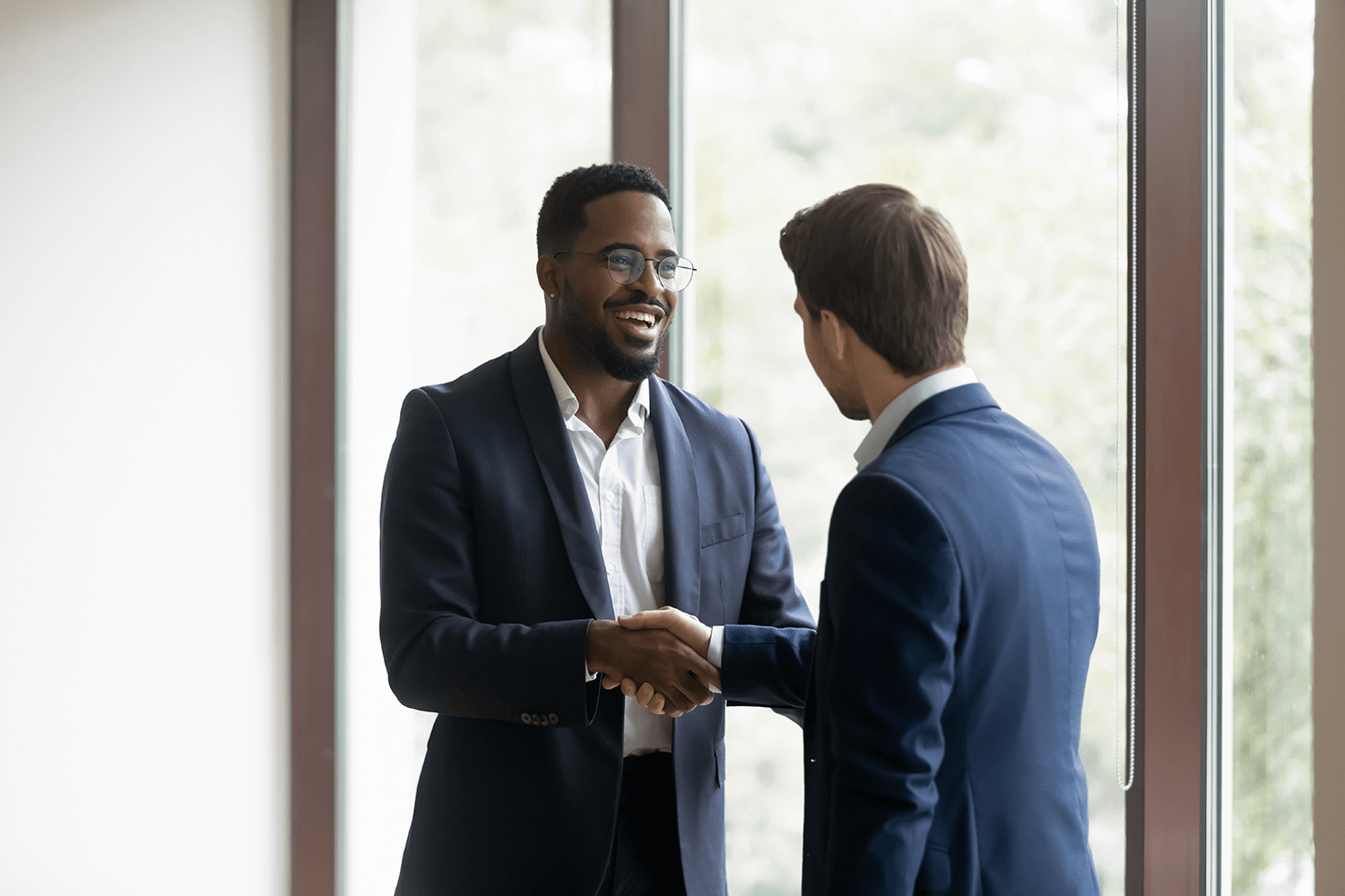 2 men shaking hands