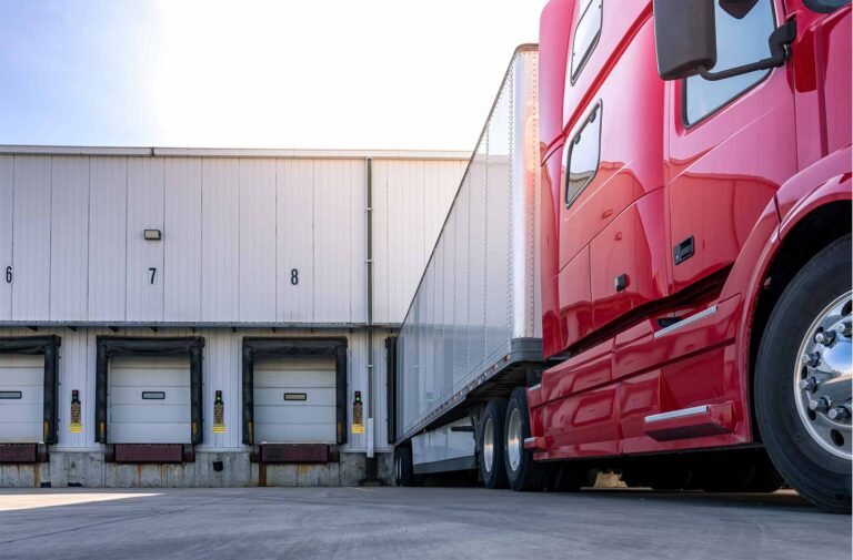 truck parked in a lot waiting to be loaded